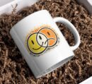 Dual Mood Smile Sun Mug – Happy & Sad Face Design