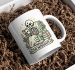 The Introvert Mug – Skeleton Reading Cozy Dark Academia Coffee Cup